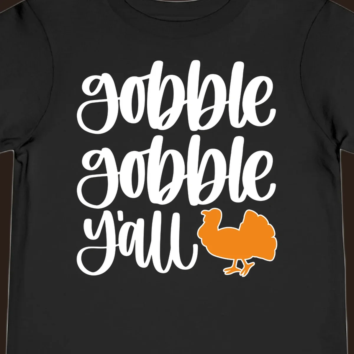Gobble gobble y'all text with a turkey illustration, gobble-gobble-turkey Thanksgiving design.
