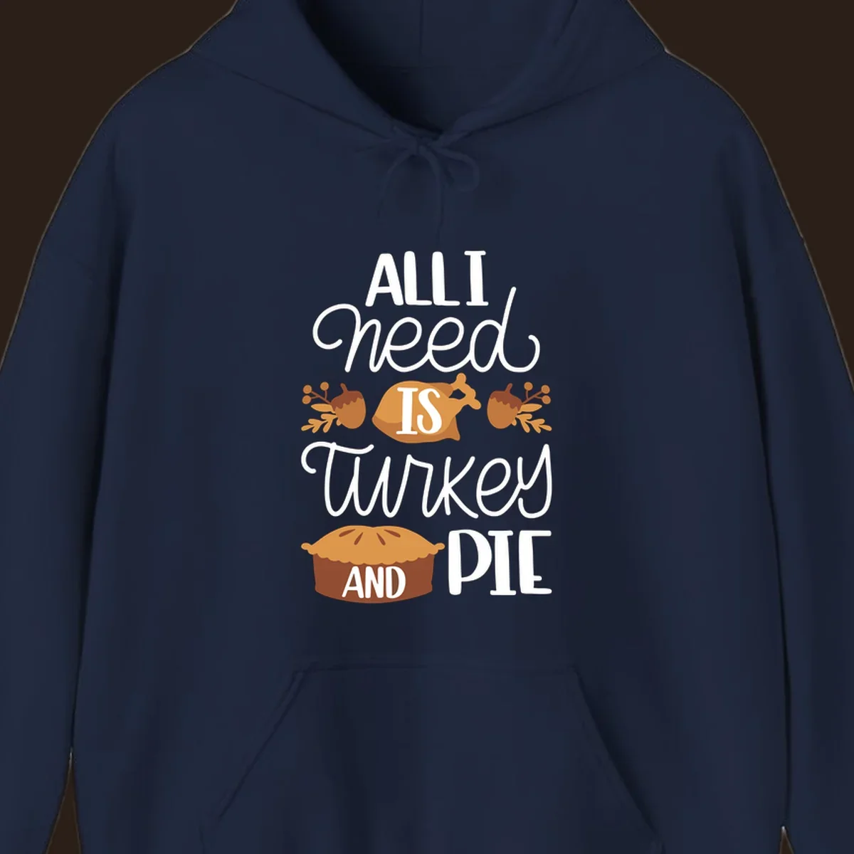 Typography design with illustrations of turkey, pie, and acorns, saying 'ALL I NEED IS TURKEY AND PIE'.