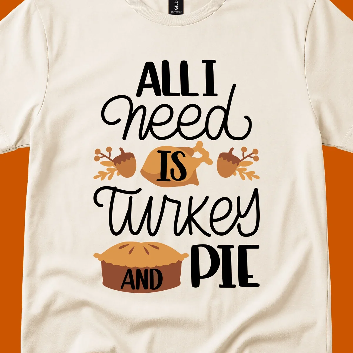 Typography design with illustrations of turkey, pie, and acorns, saying 'ALL I NEED IS TURKEY AND PIE'.