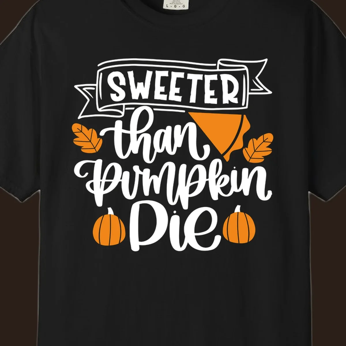 Sweeter than pumpkin pie thanksgiving design with text, pie slice, leaves, and pumpkins.