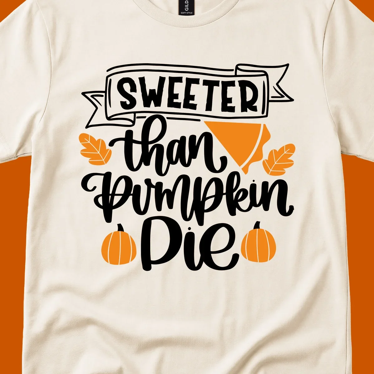 Sweeter than pumpkin pie thanksgiving design with text, pie slice, leaves, and pumpkins.