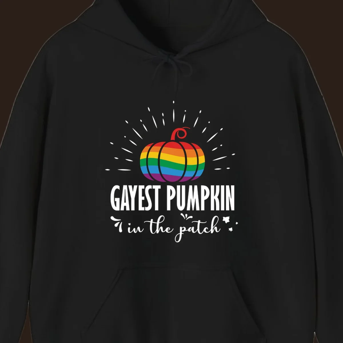 Gayest pumpkin in the patch design with rainbow pumpkin and text.