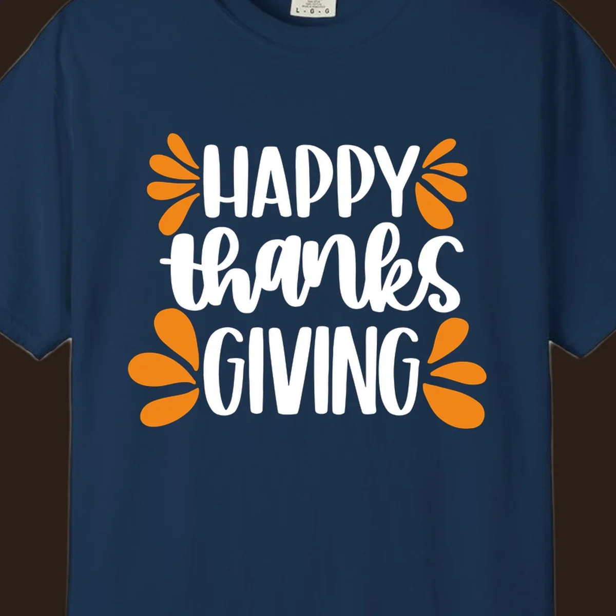 Happy Thanksgiving text with orange leaf accents, typography design.