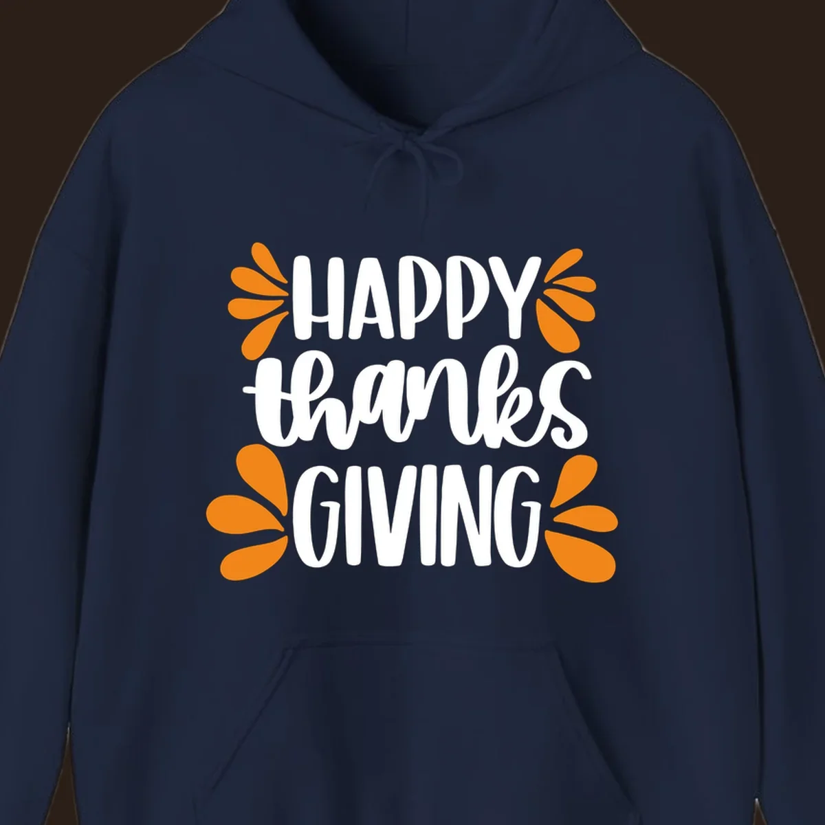 Happy Thanksgiving text with orange leaf accents, typography design.