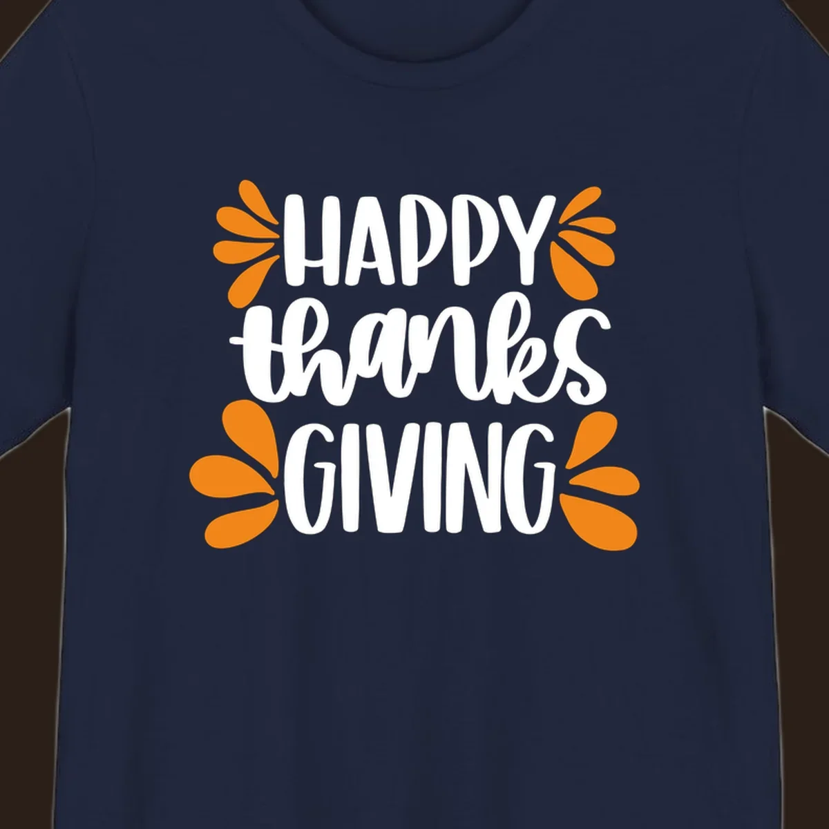 Happy Thanksgiving text with orange leaf accents, typography design.