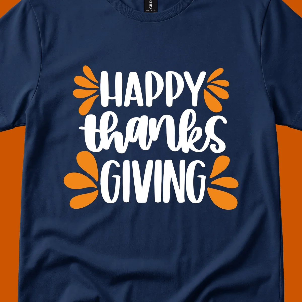 Happy Thanksgiving text with orange leaf accents, typography design.
