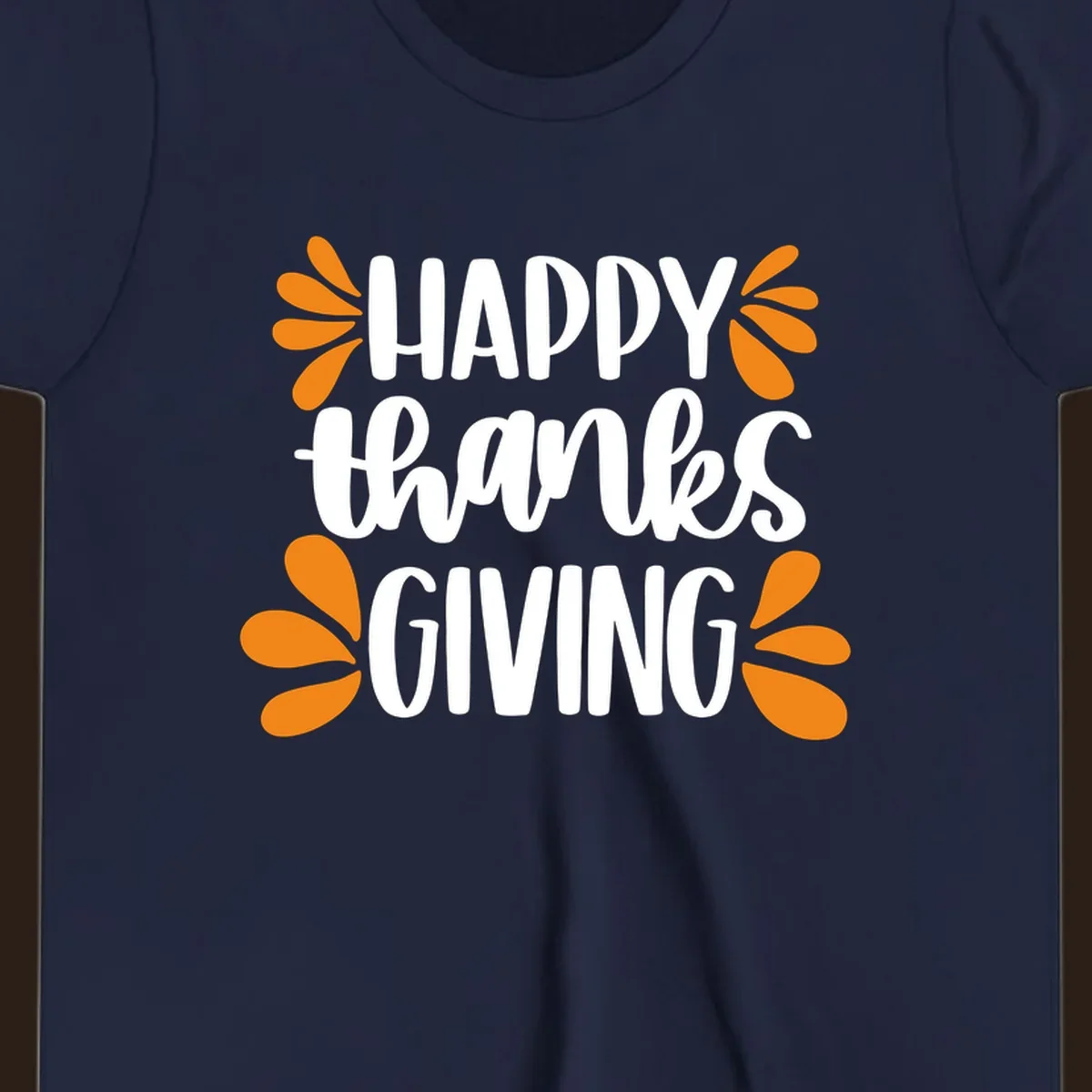 Happy Thanksgiving text with orange leaf accents, typography design.