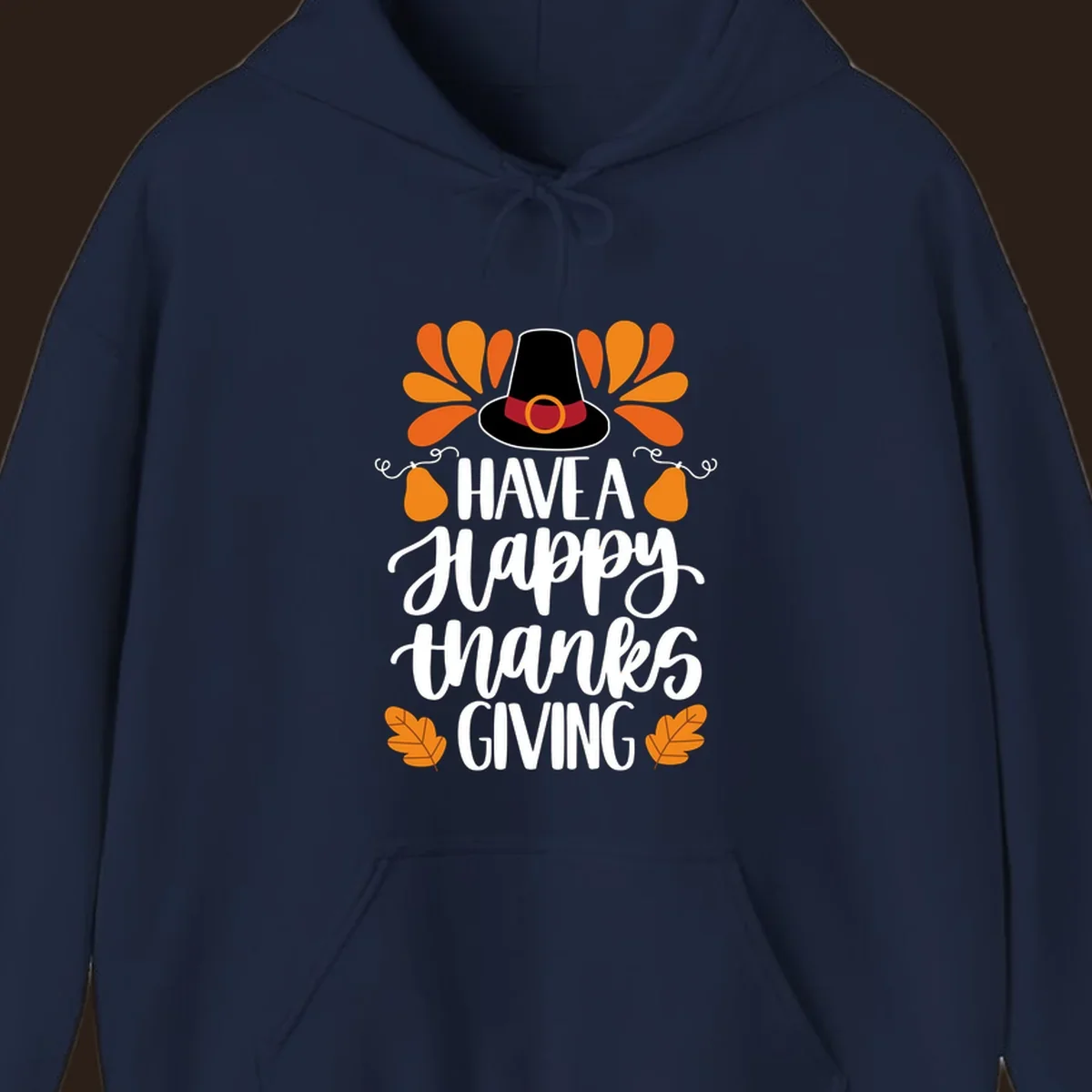 Have a Happy Thanksgiving phrase with pilgrim hat, fall leaves, and pumpkins illustration.