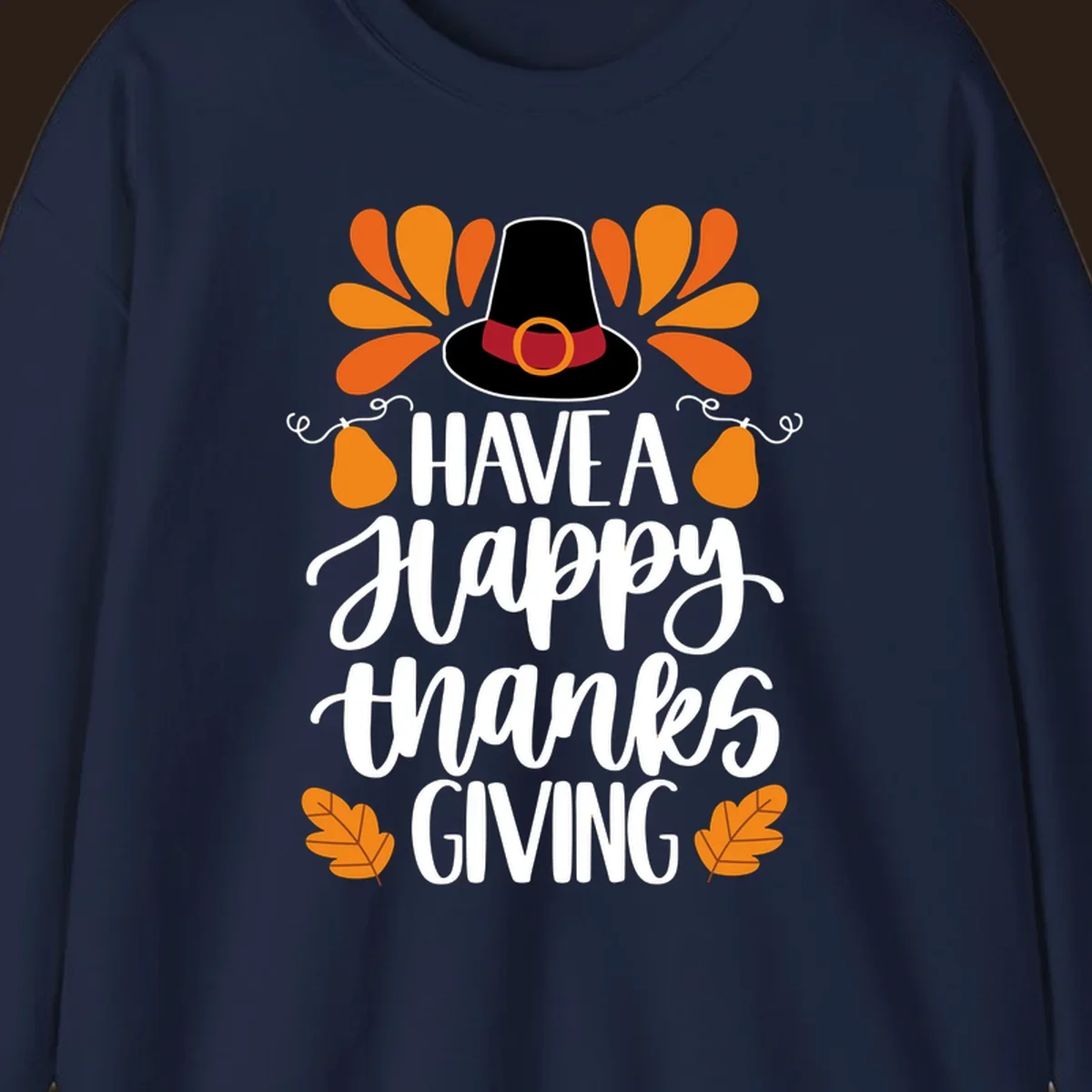 Have a Happy Thanksgiving phrase with pilgrim hat, fall leaves, and pumpkins illustration.