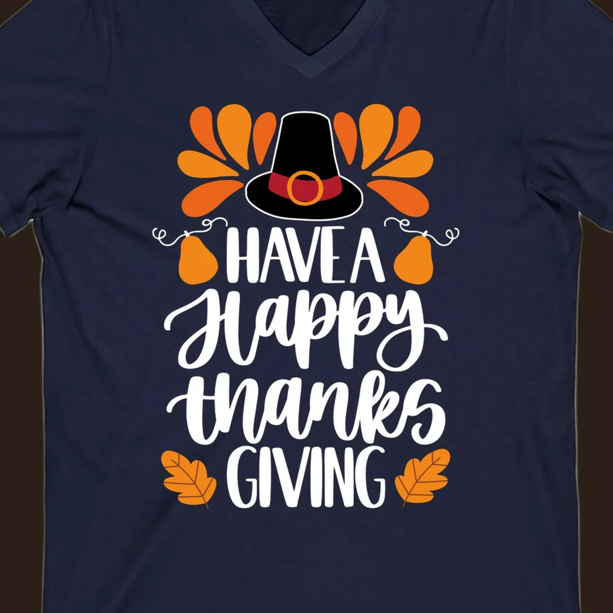 Have a Happy Thanksgiving phrase with pilgrim hat, fall leaves, and pumpkins illustration.
