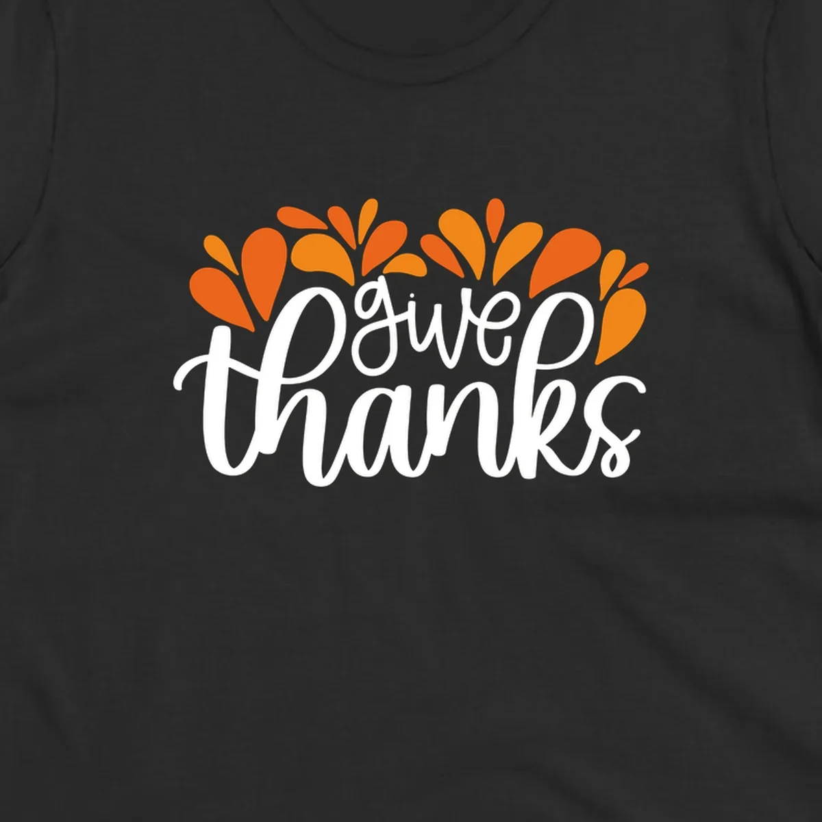 give thanks leaves design with white script text and orange leaf shapes