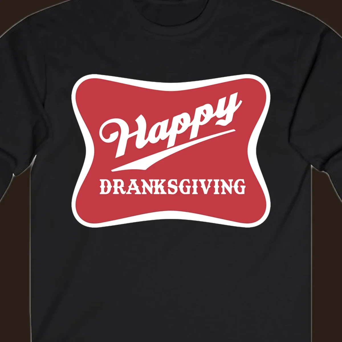 Happy Dranksgiving typography design on a red and white banner.