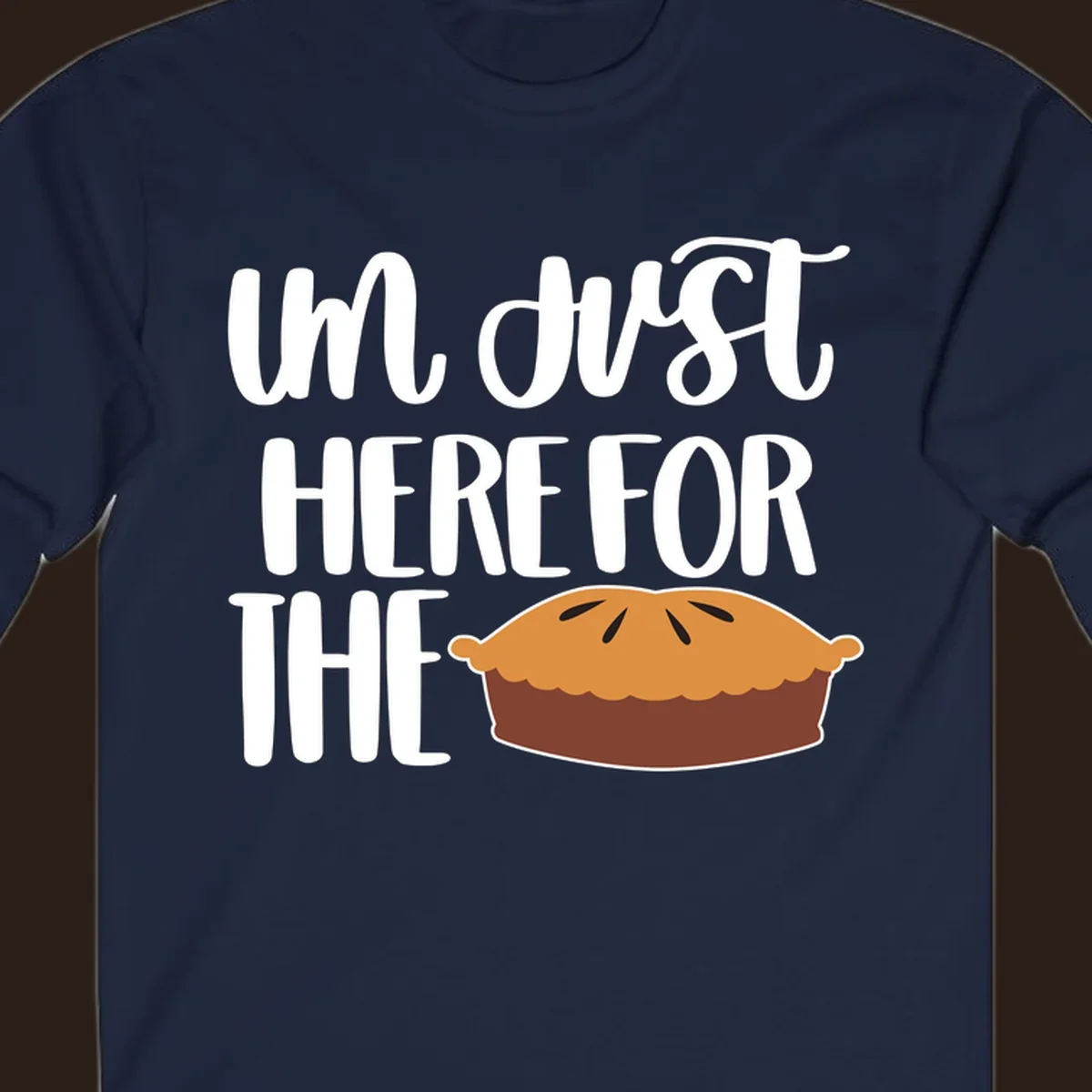I'm Just Here For The Pie Thanksgiving design with text and pie illustration.