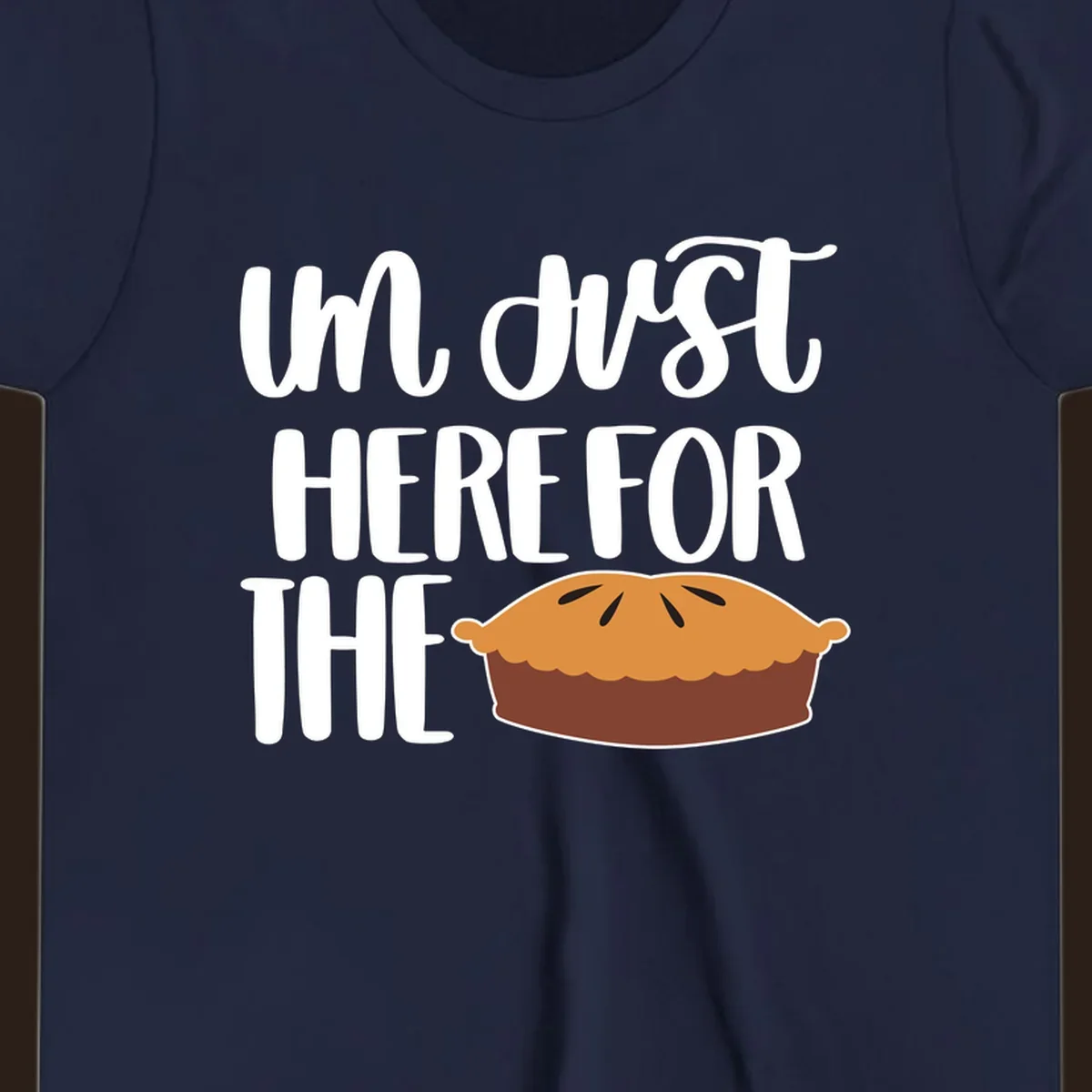 I'm Just Here For The Pie Thanksgiving design with text and pie illustration.