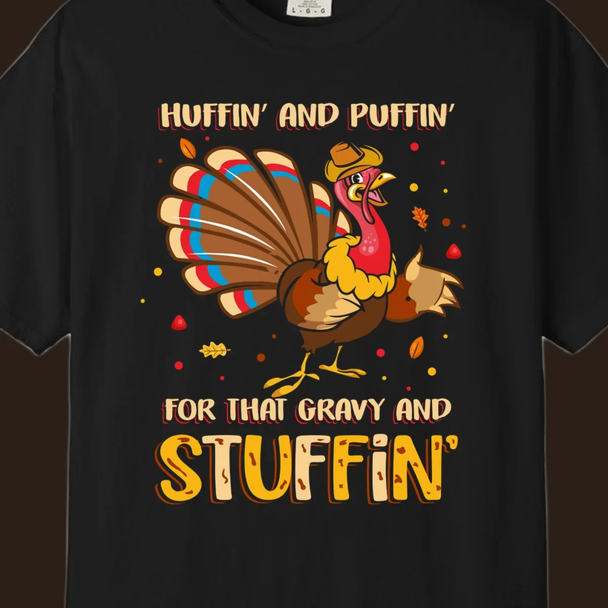 Cartoon turkey with fanned feathers and text 'Huffin And Puffin For Gravy Stuffin'
