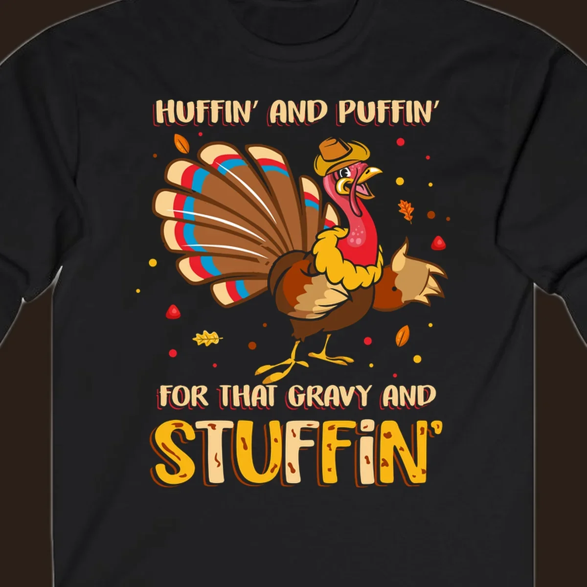 Cartoon turkey with fanned feathers and text 'Huffin And Puffin For Gravy Stuffin'