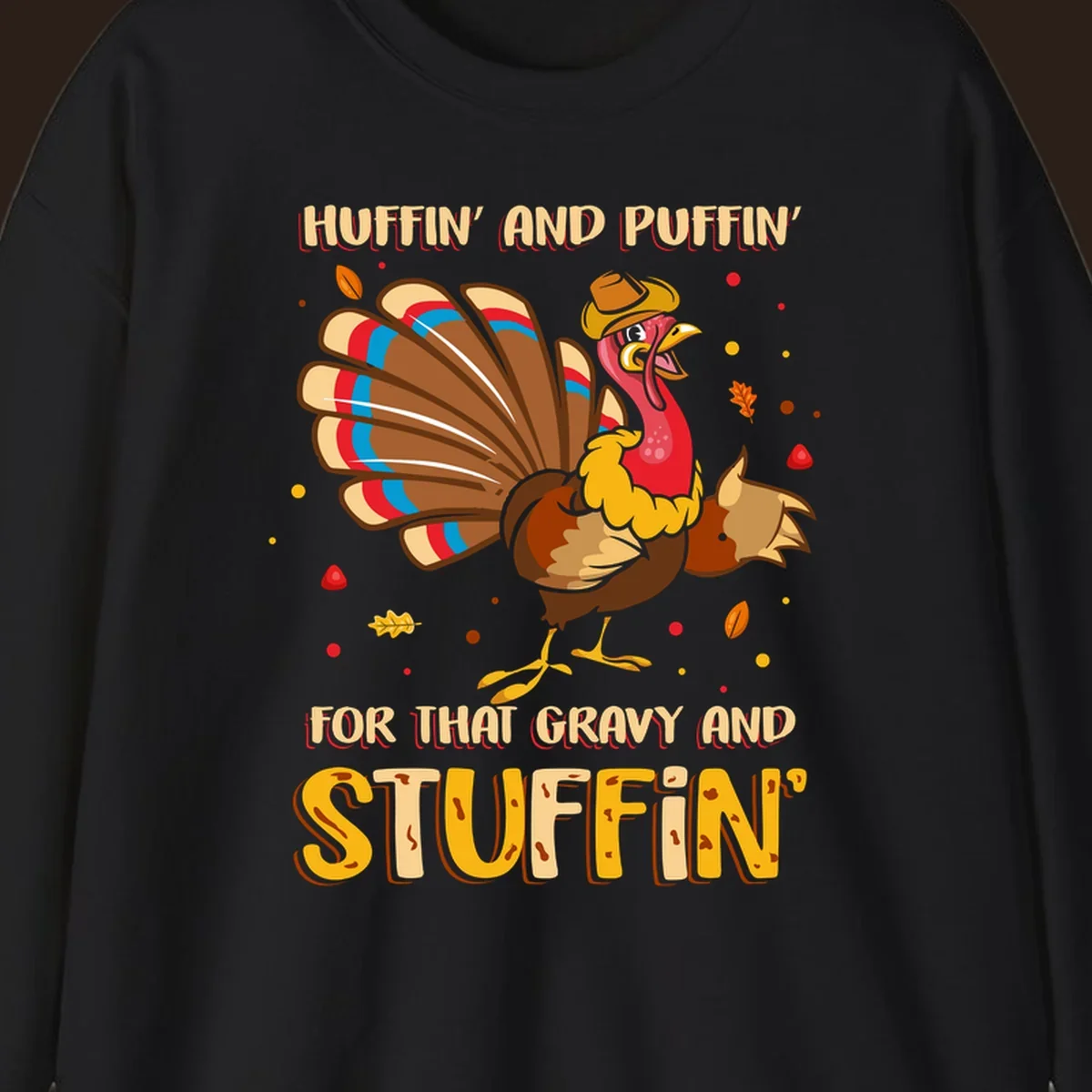 Cartoon turkey with fanned feathers and text 'Huffin And Puffin For Gravy Stuffin'