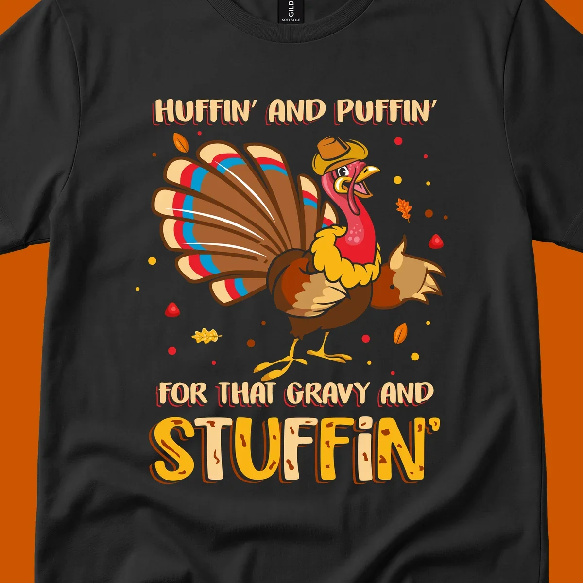 Cartoon turkey with fanned feathers and text 'Huffin And Puffin For Gravy Stuffin'