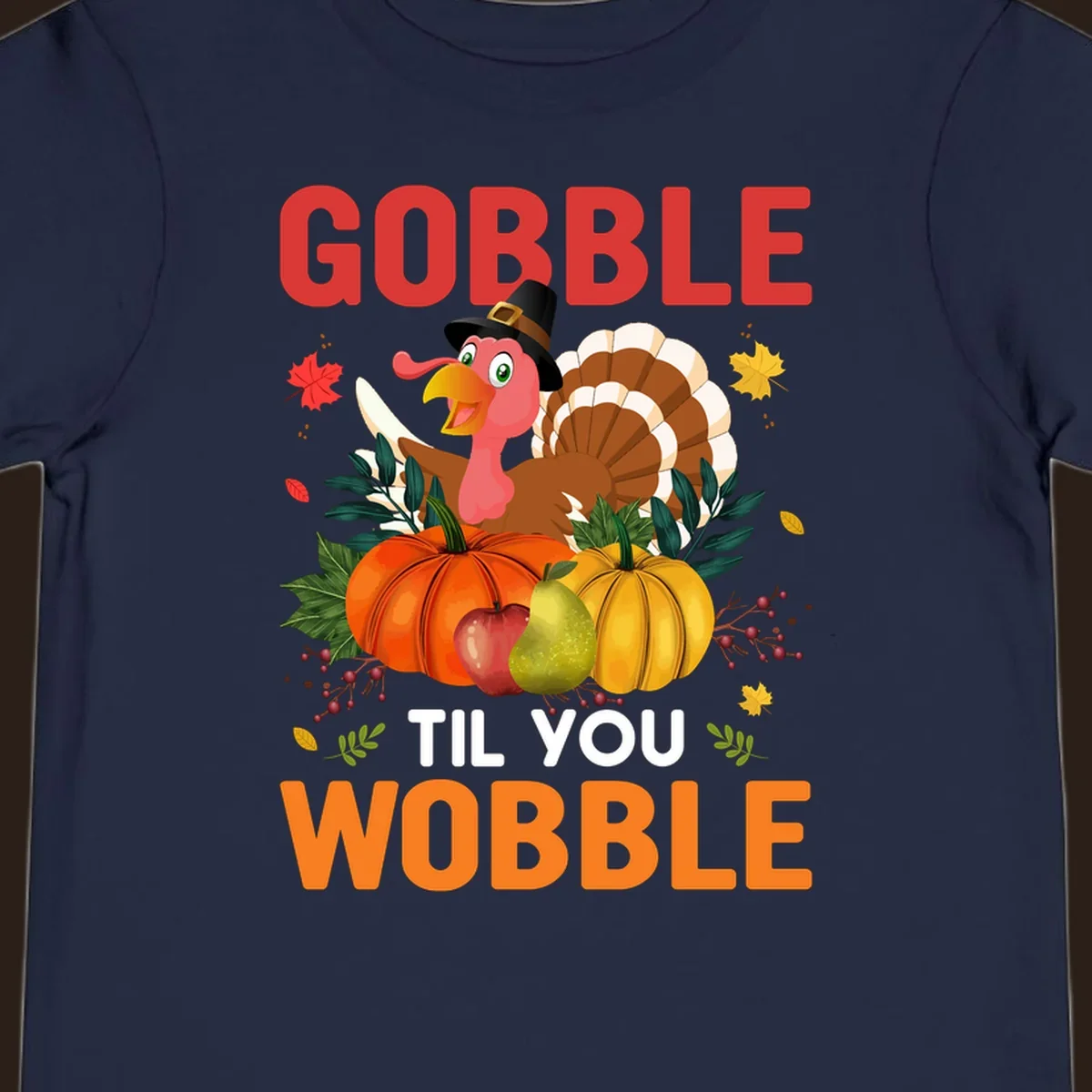 Gobble Til You Wobble Thanksgiving turkey illustration with pumpkins and text.