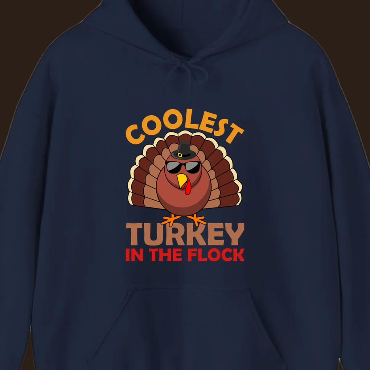Coolest turkey in the flock Thanksgiving illustration with a turkey wearing sunglasses and a hat.