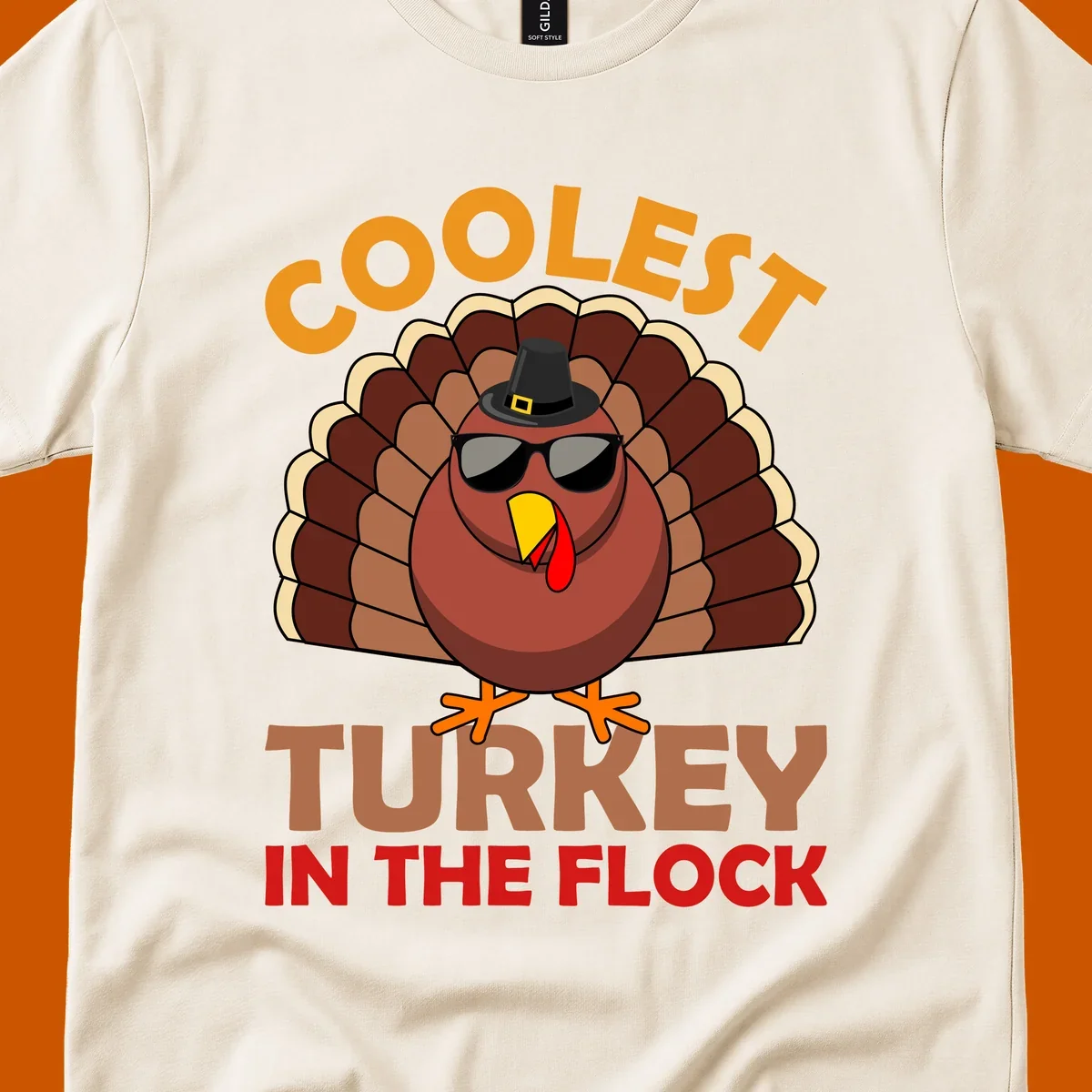 Coolest turkey in the flock Thanksgiving illustration with a turkey wearing sunglasses and a hat.