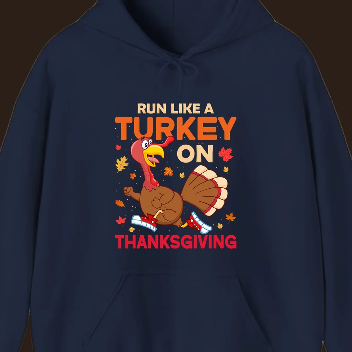 Cartoon turkey running with text Run Like A Turkey On Thanksgiving, autumn leaves and snowflakes.