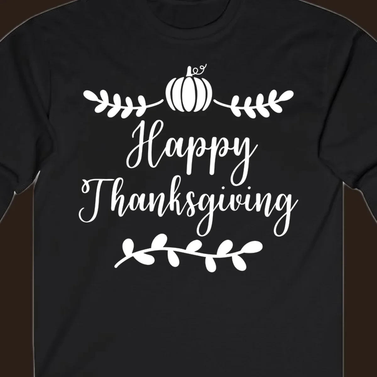 Happy Thanksgiving script text with pumpkin and leaves graphic