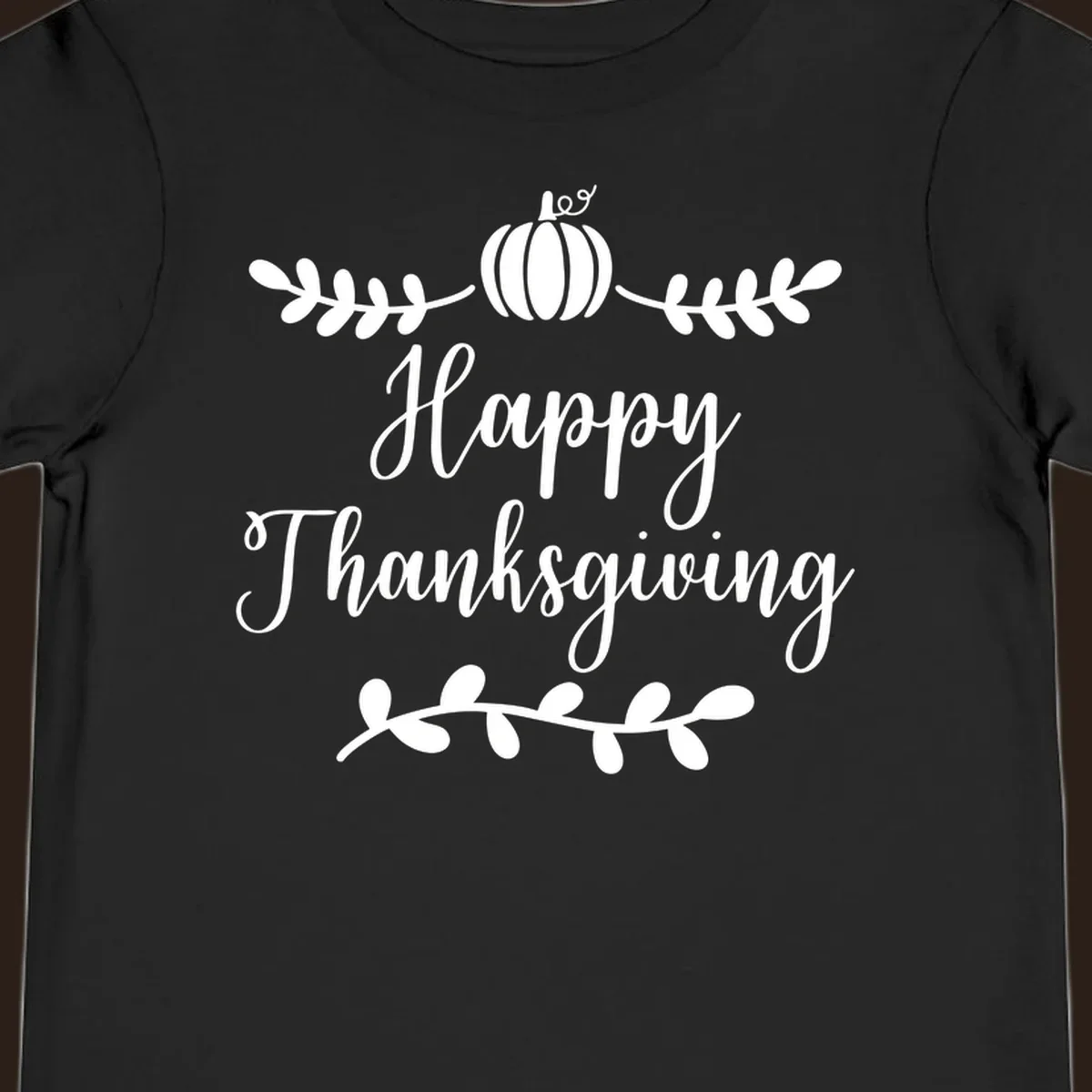 Happy Thanksgiving script text with pumpkin and leaves graphic