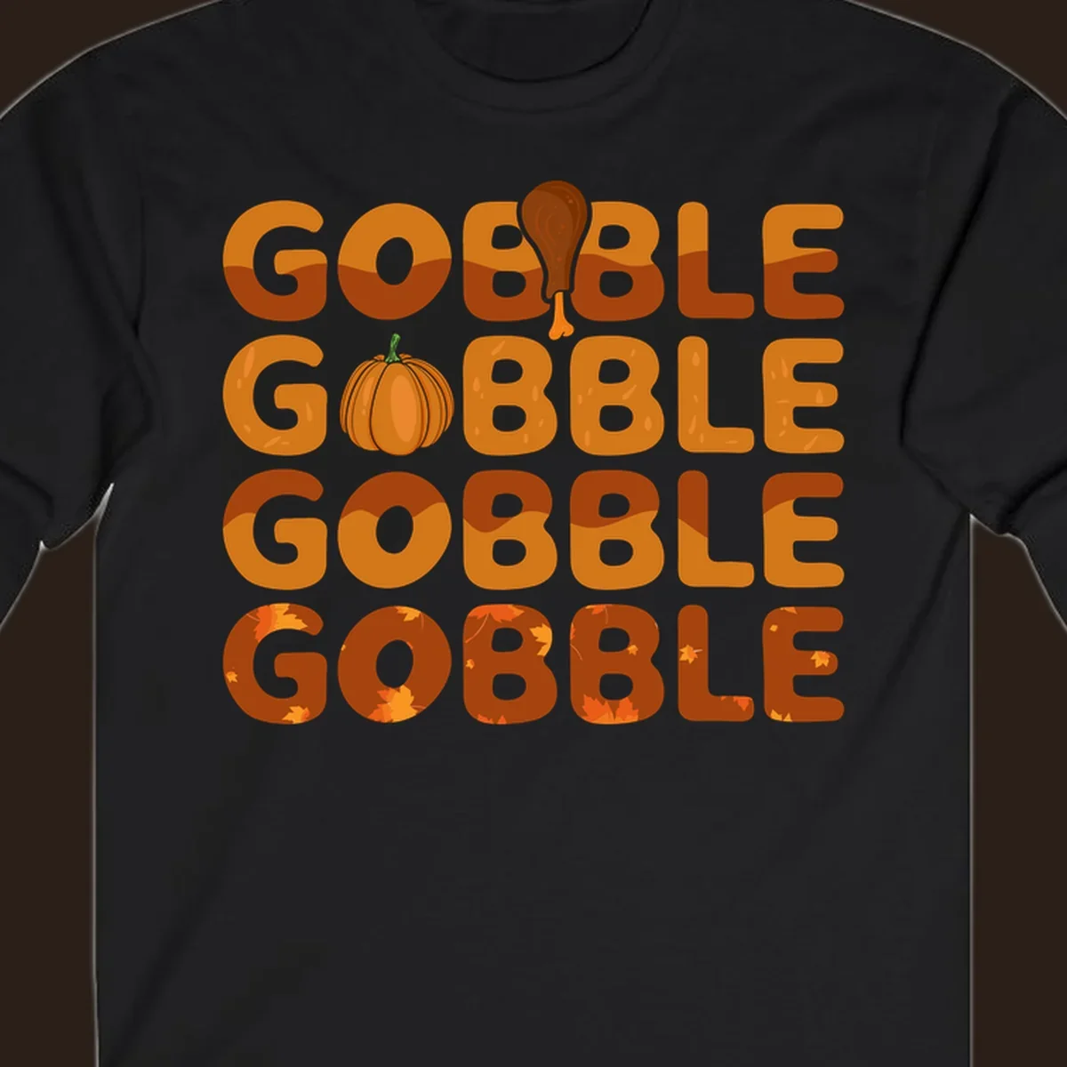 Gobble Gobble Thanksgiving text with pumpkin and turkey leg graphic