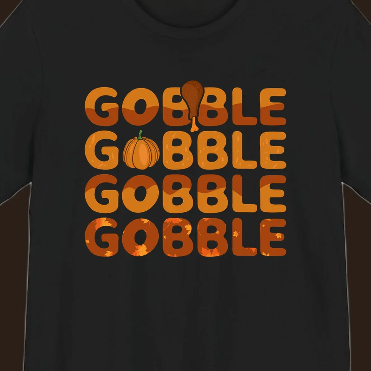 Gobble Gobble Thanksgiving text with pumpkin and turkey leg graphic
