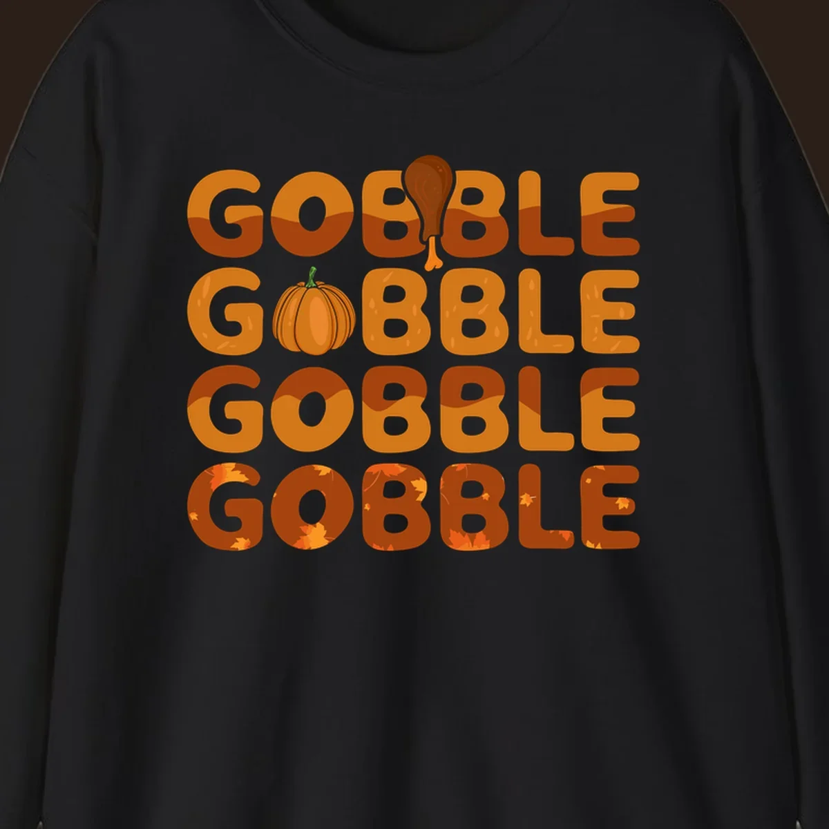 Gobble Gobble Thanksgiving text with pumpkin and turkey leg graphic