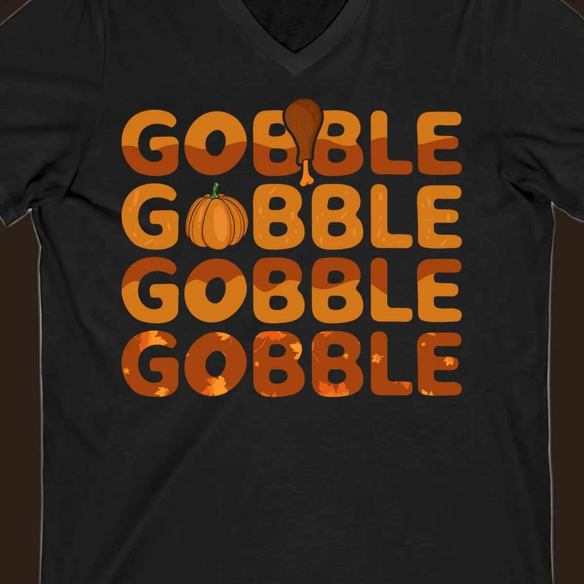 Gobble Gobble Thanksgiving text with pumpkin and turkey leg graphic