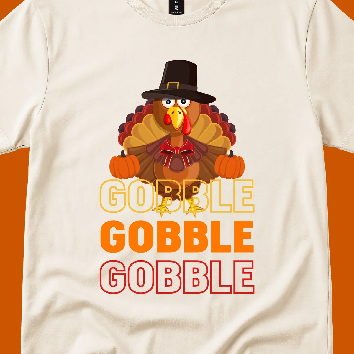 Gobble Gobble Thanksgiving Turkey illustration with pumpkins and repeated text. Thanksgiving apparel.
