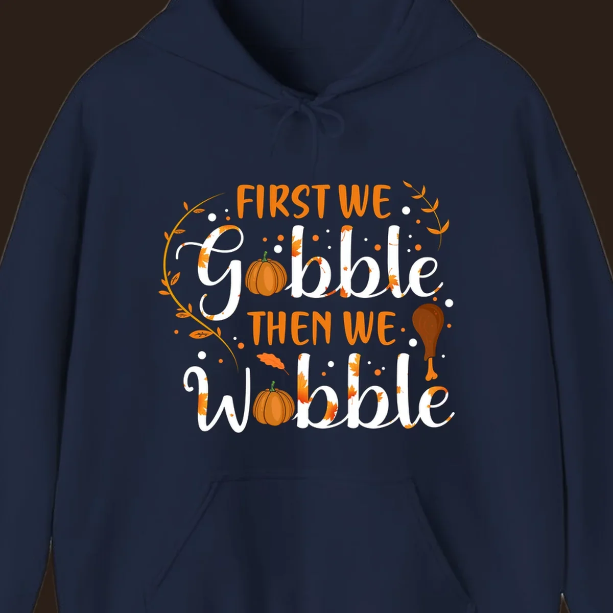 First we gobble then we wobble thanksgiving design with pumpkins and fall leaves.