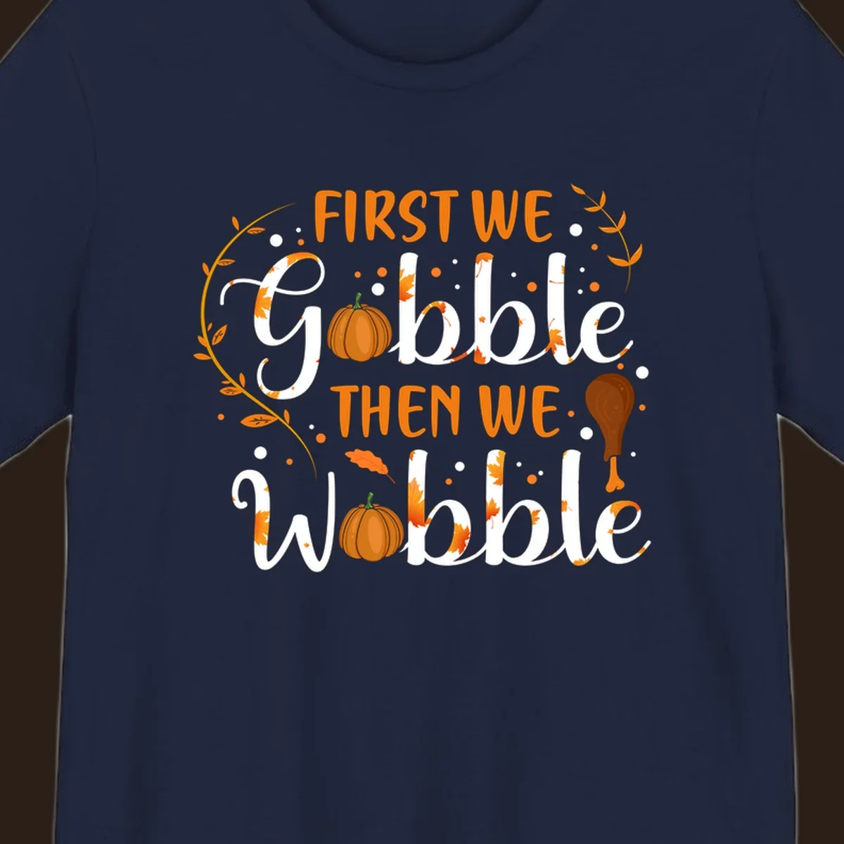 First we gobble then we wobble thanksgiving design with pumpkins and fall leaves.