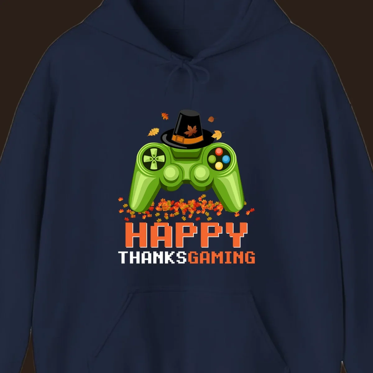Happy Thanksgaming design with a video game controller, pilgrim hat, and fall leaves.