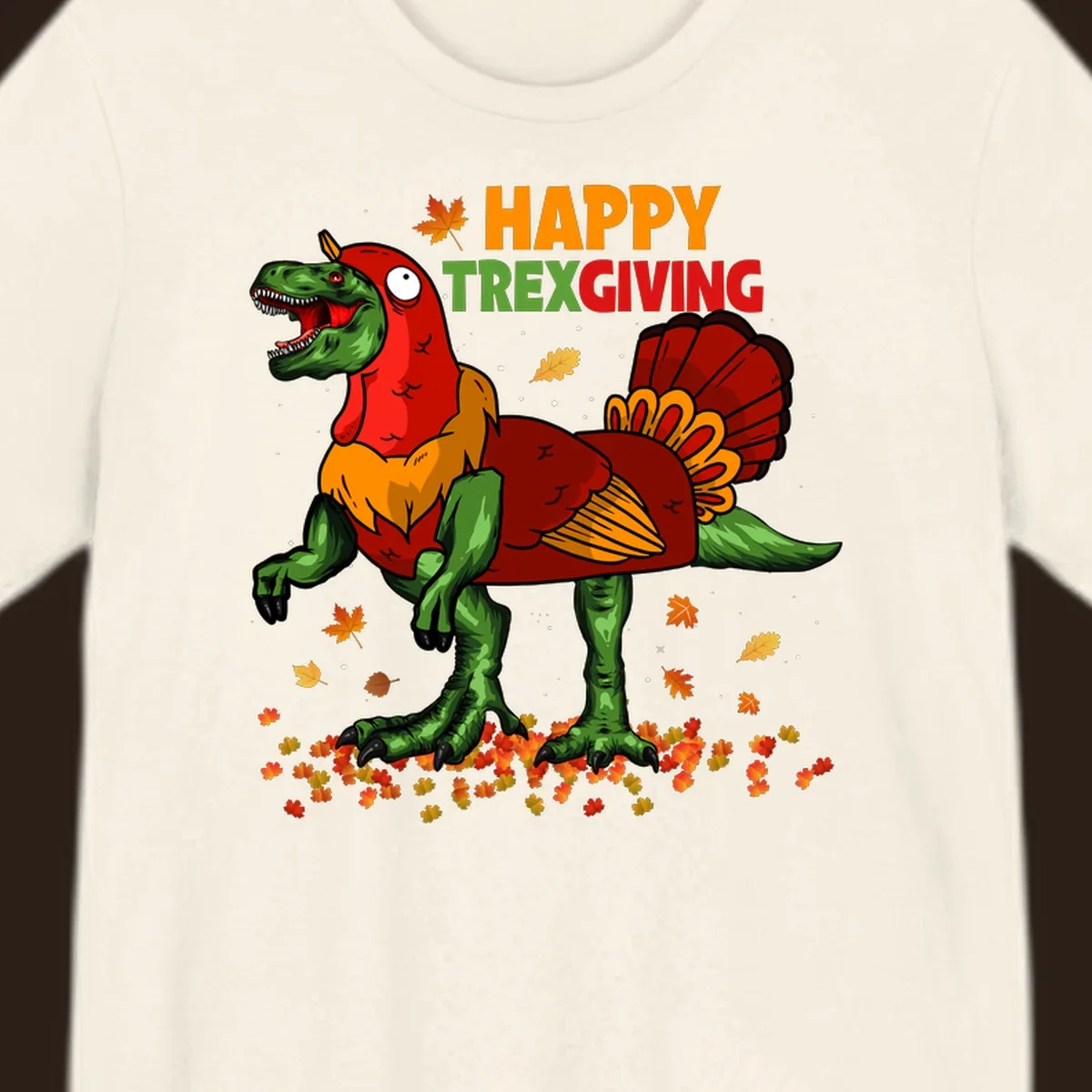 Dinosaur in a turkey costume with 'Happy Trexgiving' text and fall leaves.
