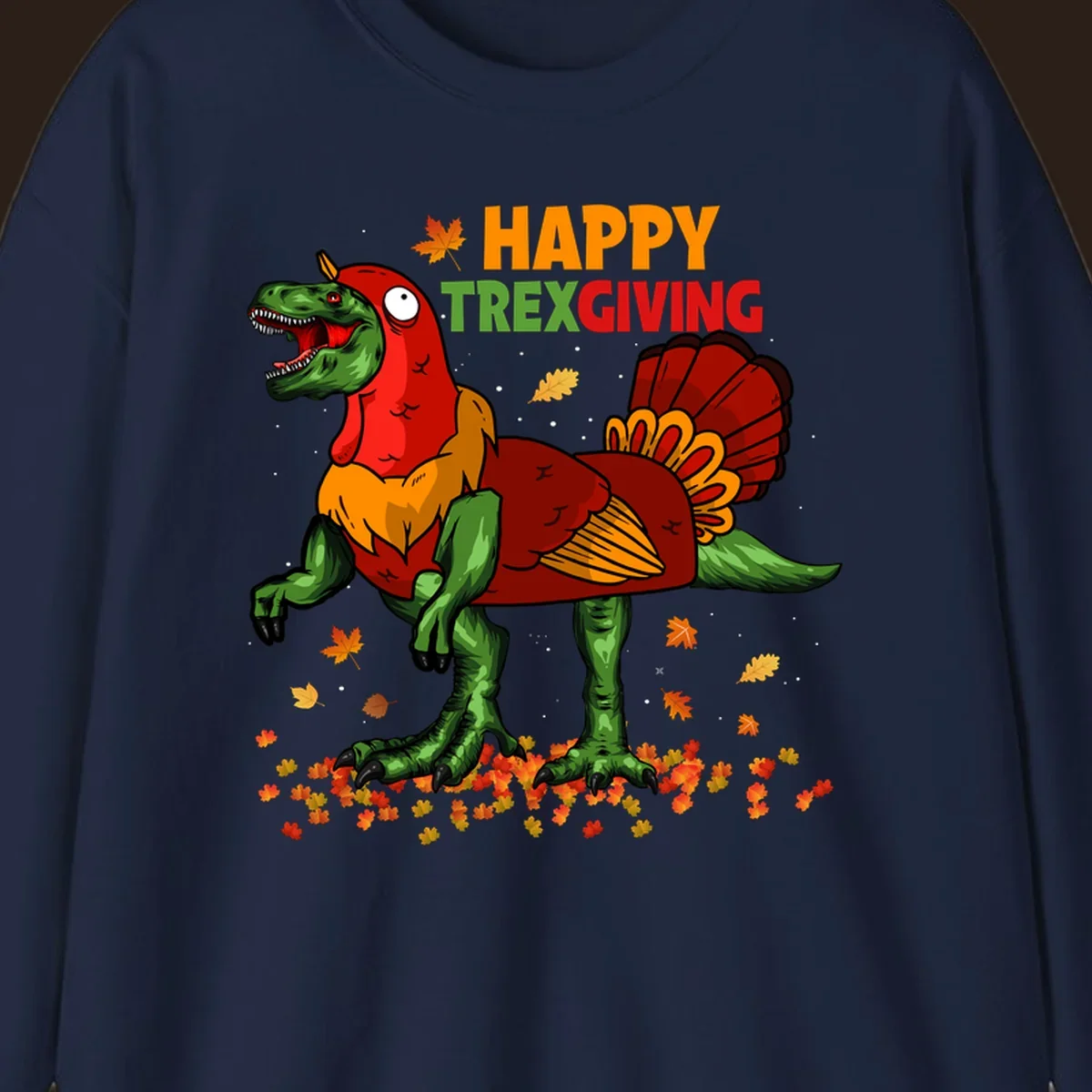Dinosaur in a turkey costume with 'Happy Trexgiving' text and fall leaves.