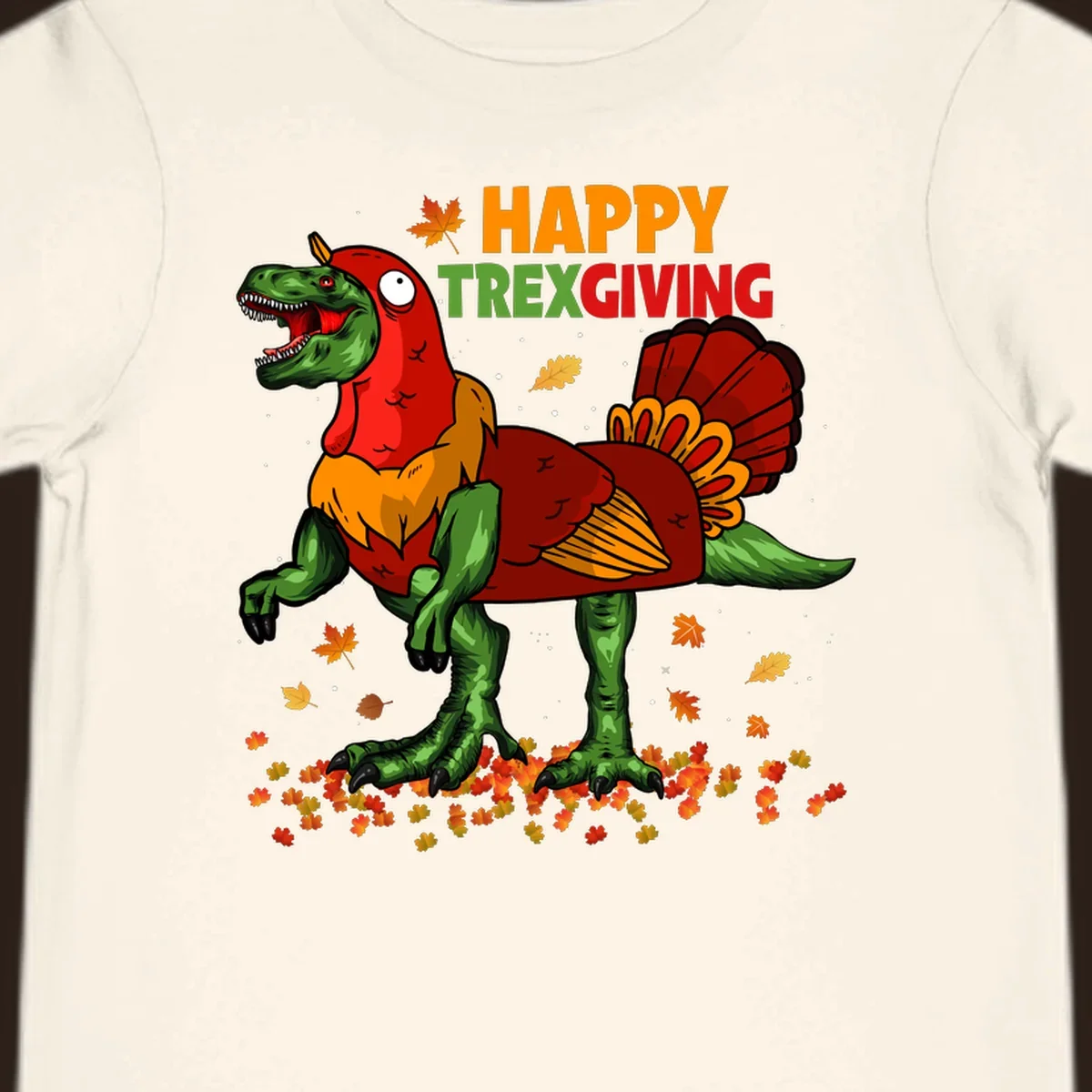 Dinosaur in a turkey costume with 'Happy Trexgiving' text and fall leaves.