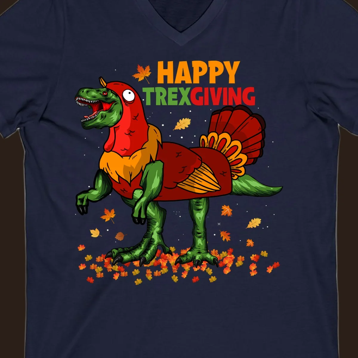 Dinosaur in a turkey costume with 'Happy Trexgiving' text and fall leaves.