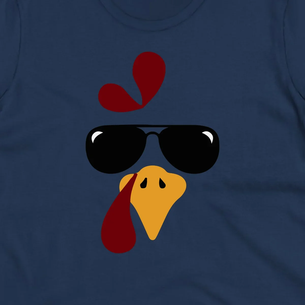 Cool turkey face wearing sunglasses graphic for Thanksgiving shirt.