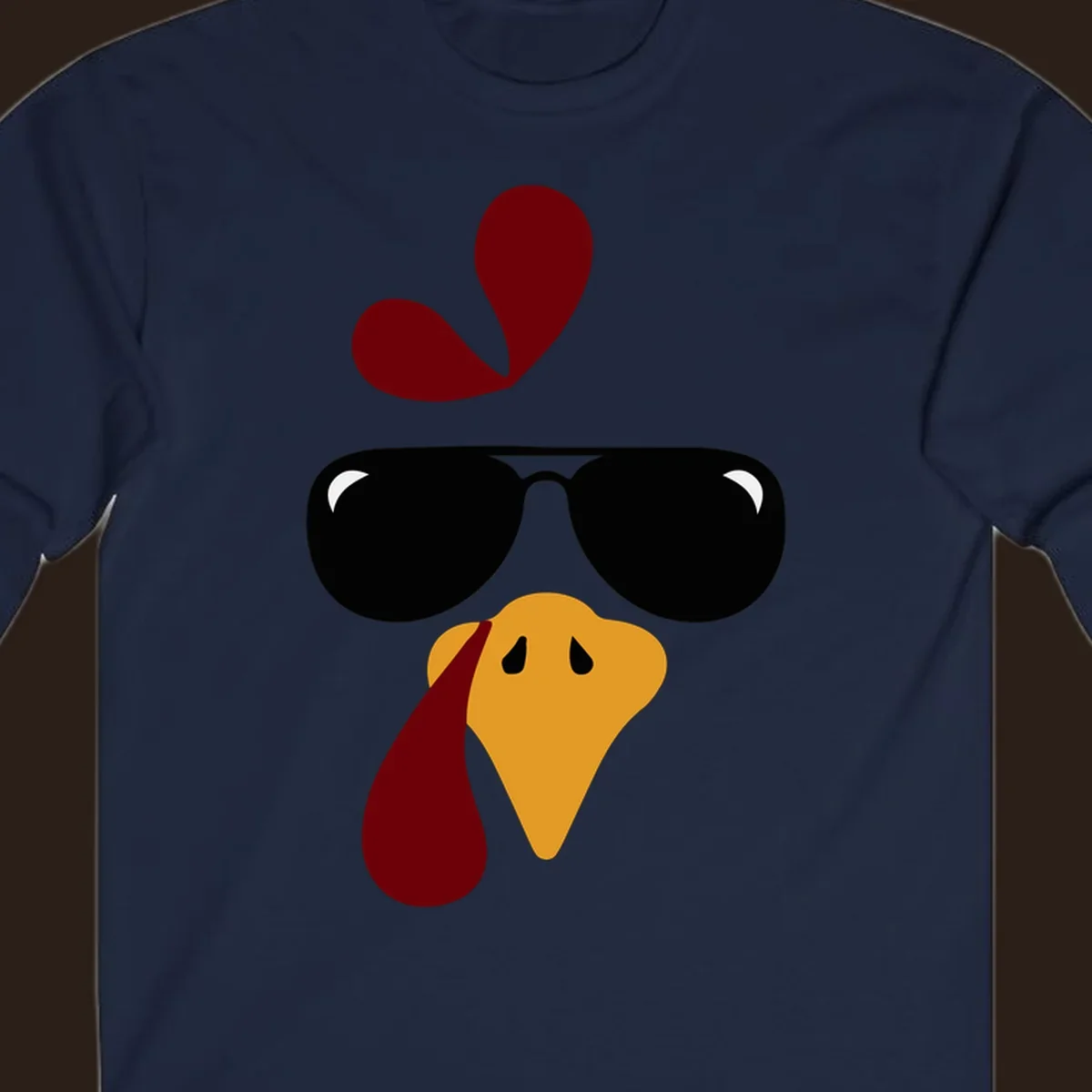 Cool turkey face wearing sunglasses graphic for Thanksgiving shirt.