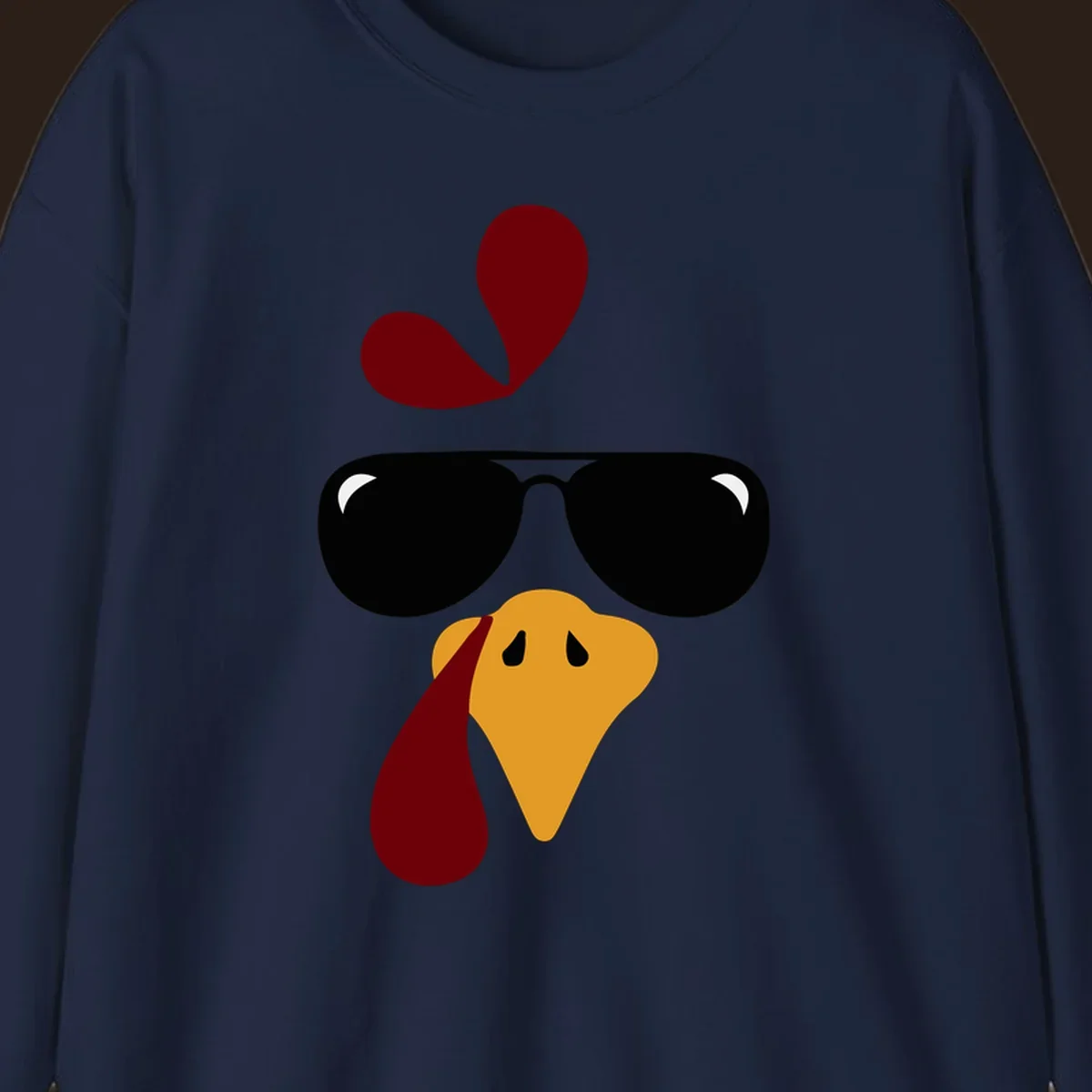 Cool turkey face wearing sunglasses graphic for Thanksgiving shirt.