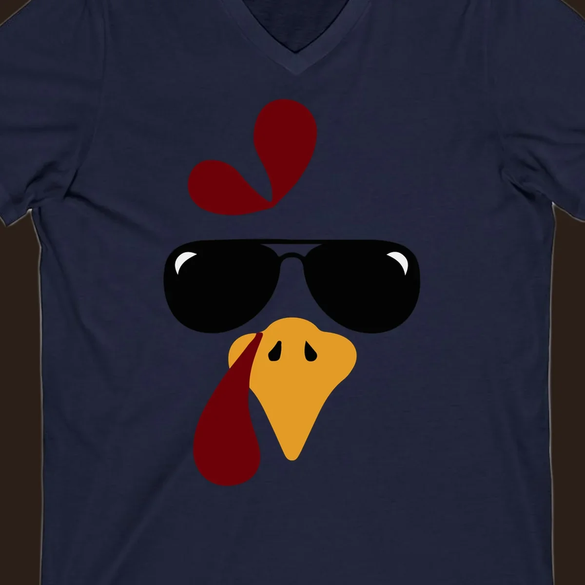 Cool turkey face wearing sunglasses graphic for Thanksgiving shirt.