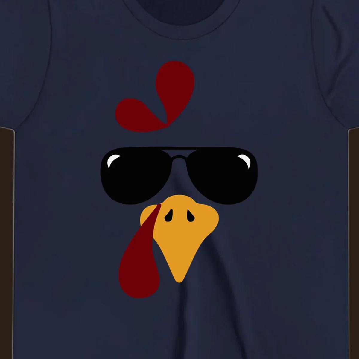 Cool turkey face wearing sunglasses graphic for Thanksgiving shirt.