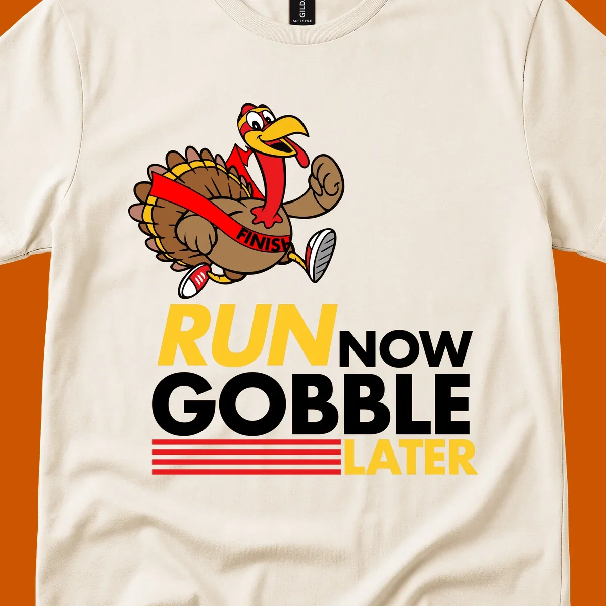 Cartoon turkey running with text 'Run Now Gobble Later', run-gobble-thanksgiving