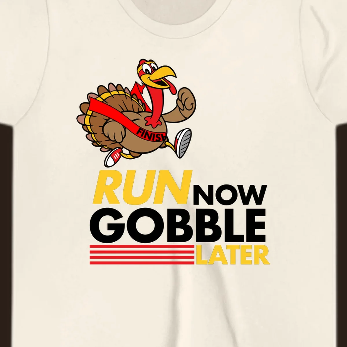 Cartoon turkey running with text 'Run Now Gobble Later', run-gobble-thanksgiving