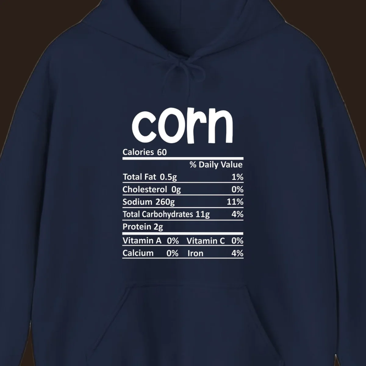 White text 'corn' and a nutritional facts label on a dark background.