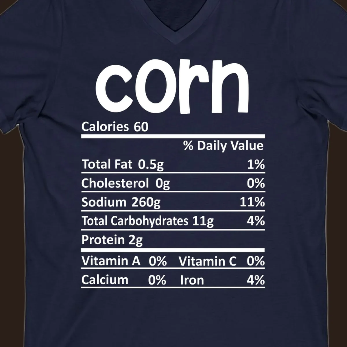White text 'corn' and a nutritional facts label on a dark background.