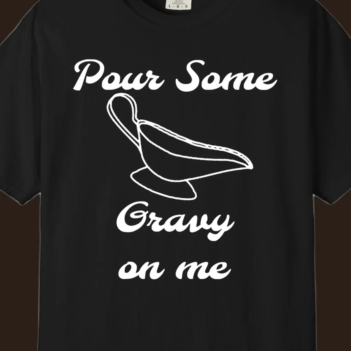 Pour Some Gravy On Me graphic with a gravy boat illustration on a black background.